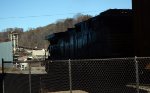 NS yard job E19 is in the shadow of the John Lynch bridge (VA 163) as it eases into the yard to deliver cars to CSX